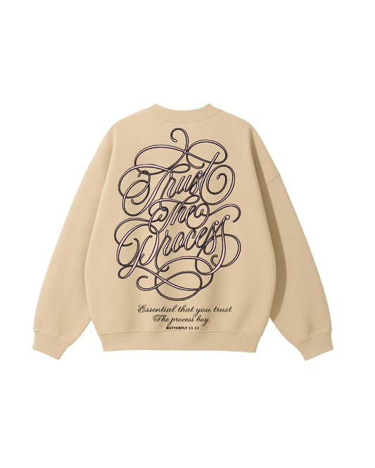 Polo trust the process modelo clásico beige